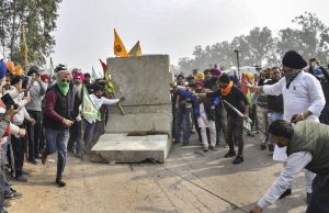 Read more about the article Video: Protesting Farmers Throw Barriers From Flyover, Face Water Cannons