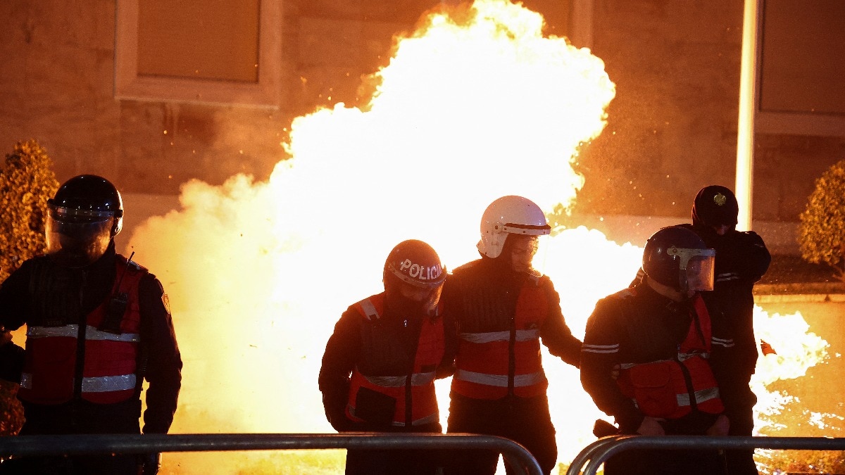 Opposition protesters in Albania hurl petrol bombs at government building