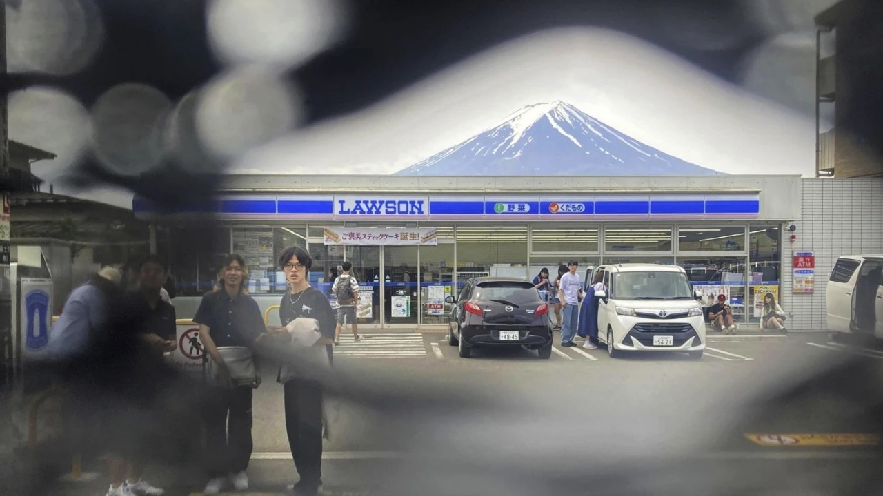Read more about the article Holes poked in barrier blocking Japan’s Mount Fuji view