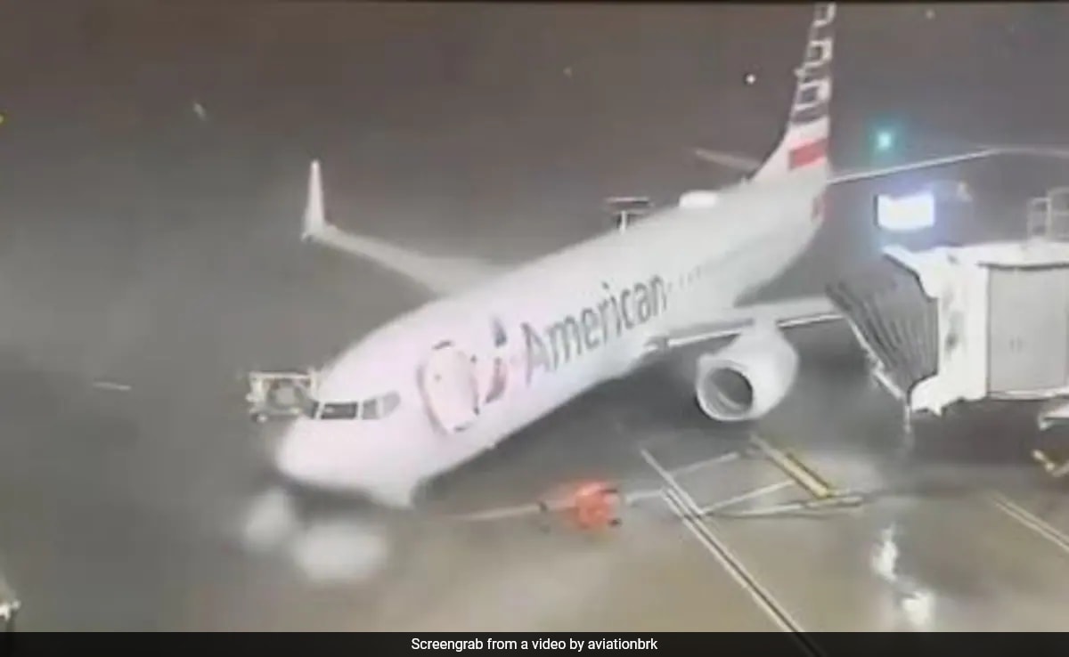 Strong Winds Push American Airlines Plane Away From Gate