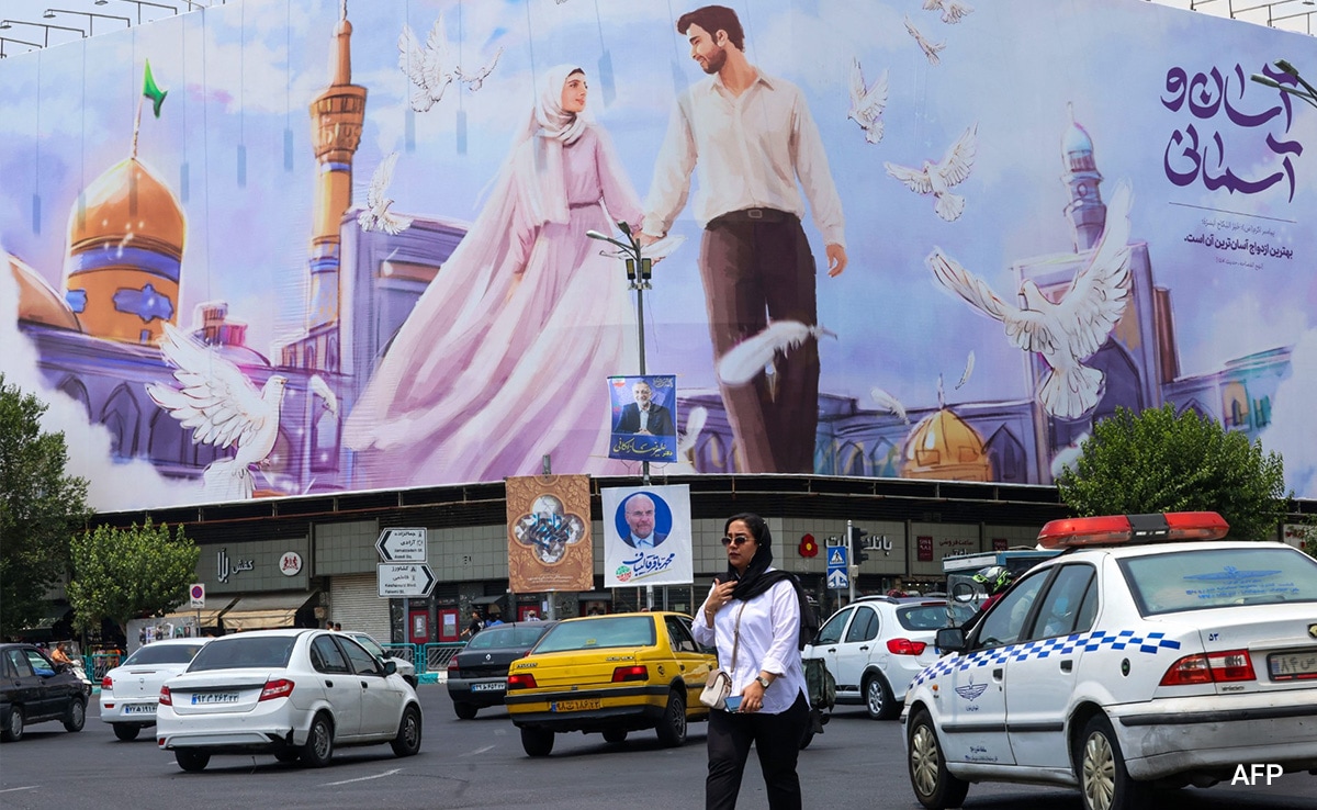 Read more about the article Iranians Split On Presidential Vote As Hardships Mount