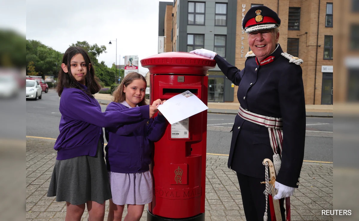 First Red Mail Box With King Charles’ Cypher Unveiled In Central England