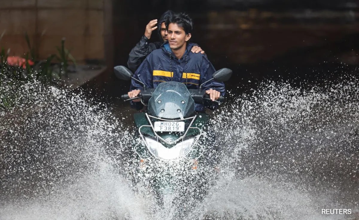 Watch: Heavy Rain Brings Mumbai To A Standstill, Trains Hit, Schools Shut