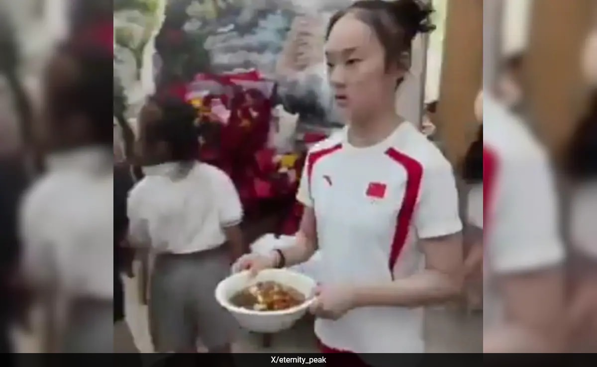 Watch: Chinese Gymnast Works In Restaurant After Winning Olympics Silver