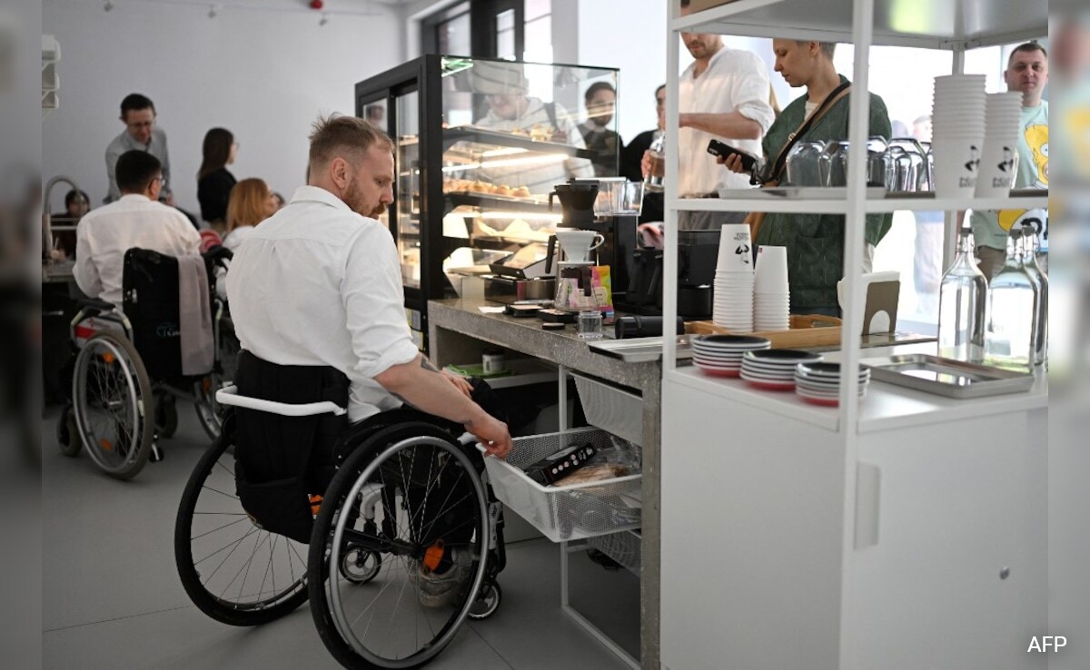 This Belarusian Wheelchair Barista Claims To Make The World Better