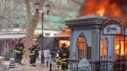 Fire engulfs a section of Manhattan’s popular Bryant Park holiday market